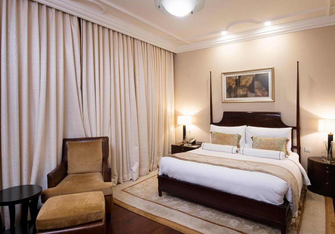The Claridges New Delhi Hotel Екстериор снимка A bedroom at the Taj Mahal Palace