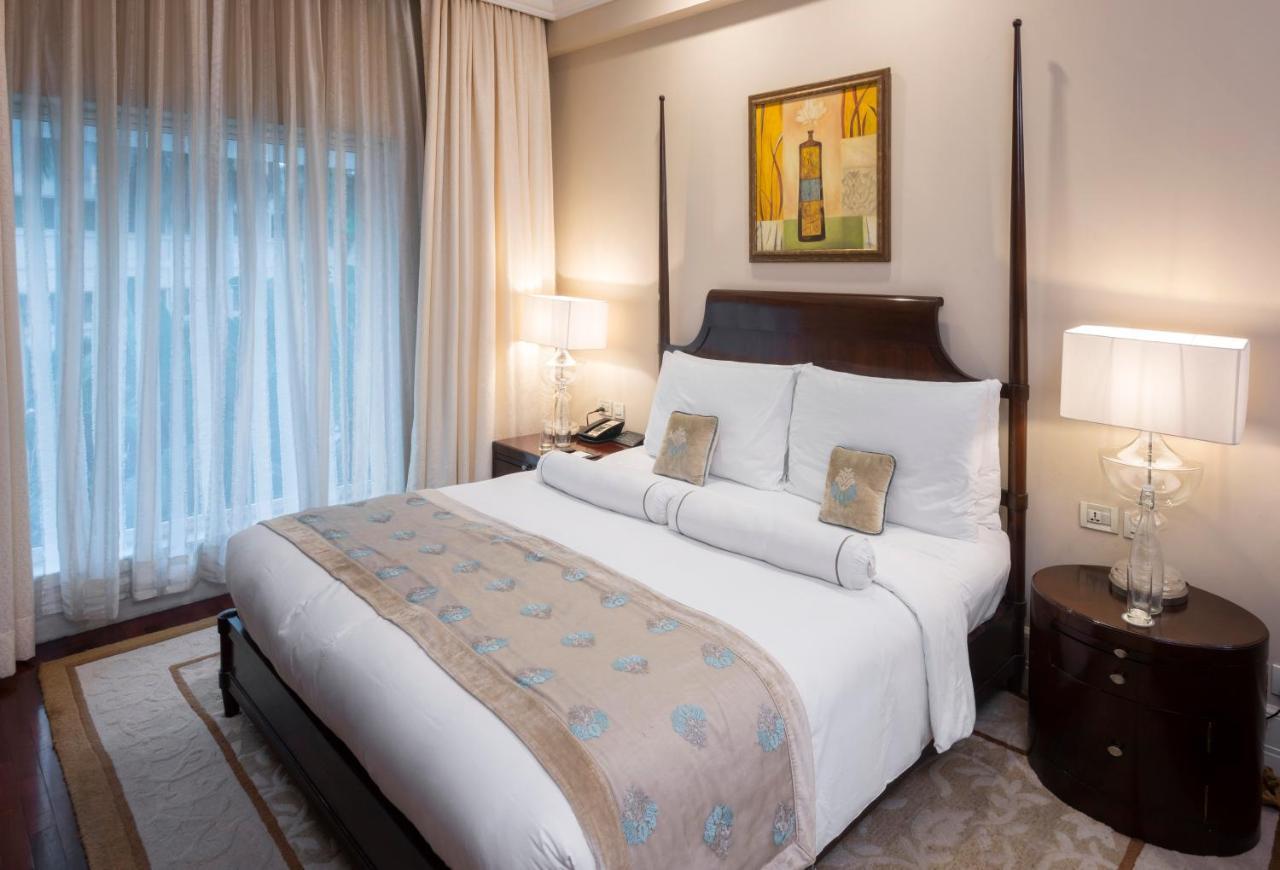 The Claridges New Delhi Hotel Екстериор снимка A bedroom at the Taj Bengal