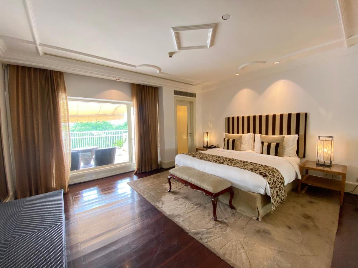 The Claridges New Delhi Hotel Екстериор снимка A bedroom at the Taj Mahal Palace