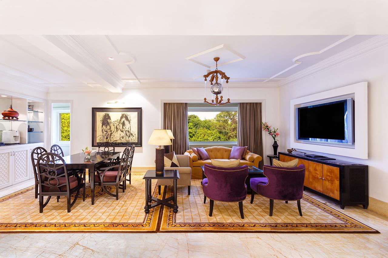The Claridges New Delhi Hotel Екстериор снимка A living room in a suite at the Four Seasons Hotel, Mumbai